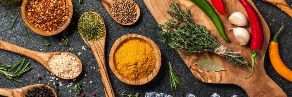 Cooking table with spices and herbs
